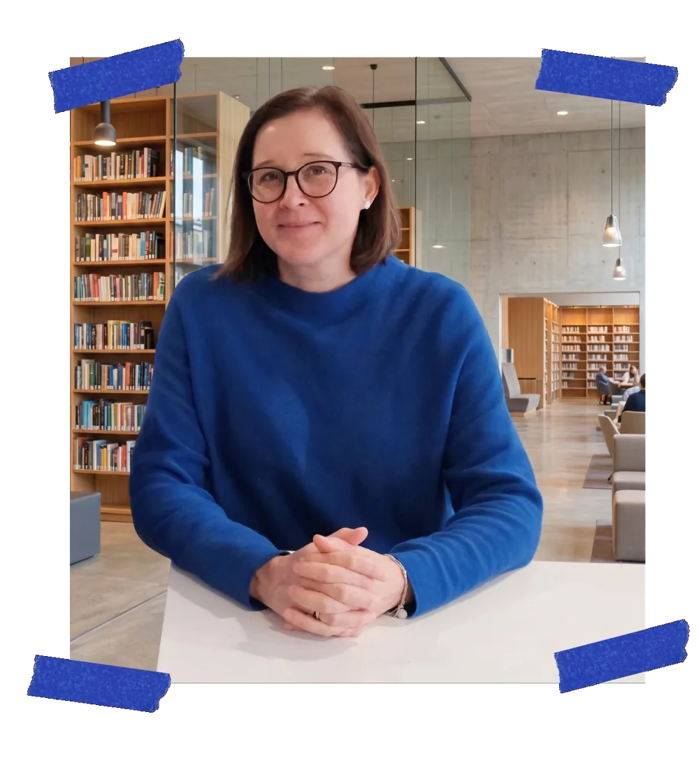 Portrait of Mel Stagg in a library